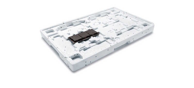 A white cargo carrier with a circuit board