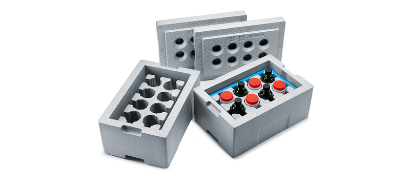 Two gray insulated boxes with laboratory bottles